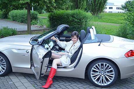 Old brunette HotMilf gets out of a convertible in a red bikini and boots - Image 2 of 16  in Outdoor category   featuring HotMilf 