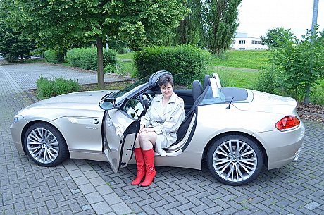 Old brunette HotMilf gets out of a convertible in a red bikini and boots - Image 3 of 16  in Outdoor category   featuring HotMilf 