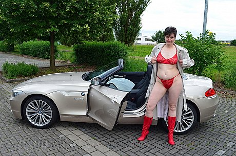 Old brunette HotMilf gets out of a convertible in a red bikini and boots - Gallery #47815