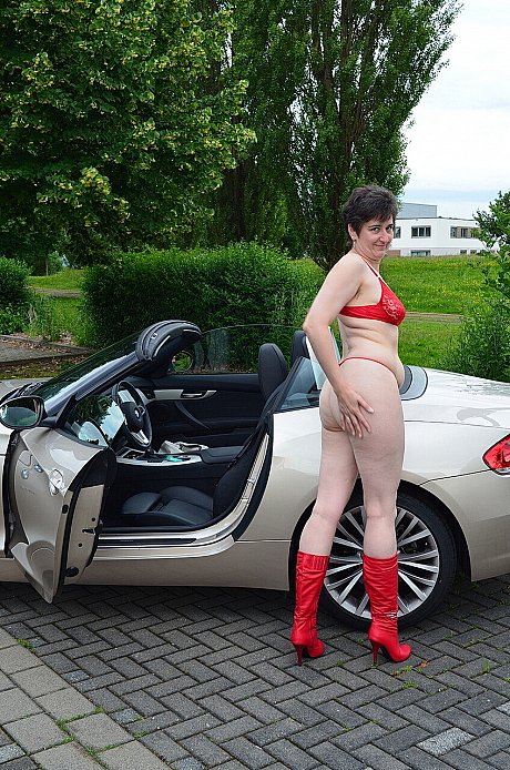 Old brunette HotMilf gets out of a convertible in a red bikini and boots - Image 12 of 16  in Outdoor category   featuring HotMilf 