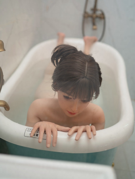 Realistic brunette sex doll Beatriz flaunts her monstrous titties in the tub - #280666