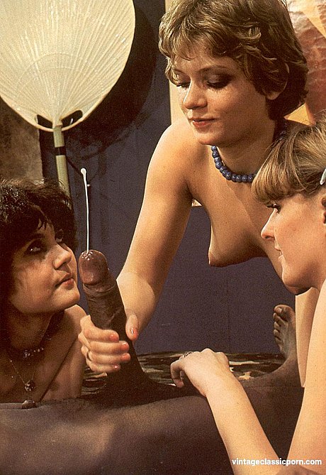 Two sweet chicks get their silky cunts screwed by a BBC in a vintage threesome
