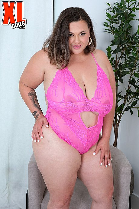 Brunette BBW Lexxxie La Fuego sucks a nipple after getting naked in heels - Image 5 of 16  in Ass category   featuring Lexxxie La Fuego 