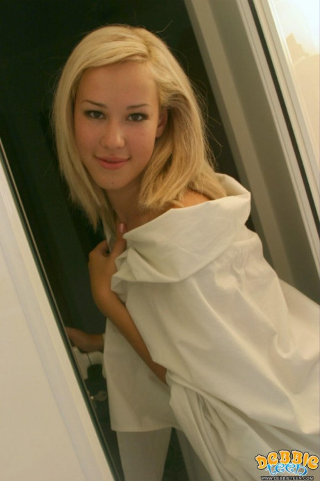 Stunning sweet blondie young shows her tan lined body while getting clean in a bathroom - #683215