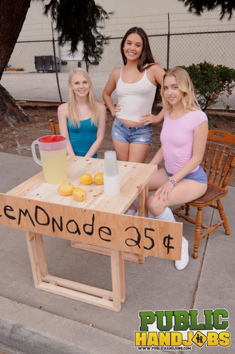 Naughty schoolgirls give their lemonande customer a handjob in public - #1022293