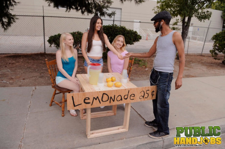 Naughty schoolgirls give their lemonande customer a handjob in public - #1022294