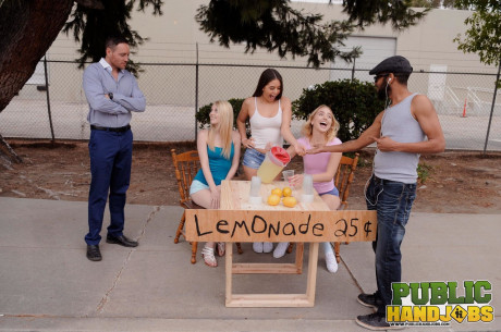 Naughty schoolgirls give their lemonande customer a handjob in public - #1022295
