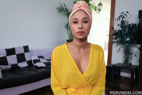 Cute MILF Cali Lee presents her hot butt and takes a rod wearing hot lingerie