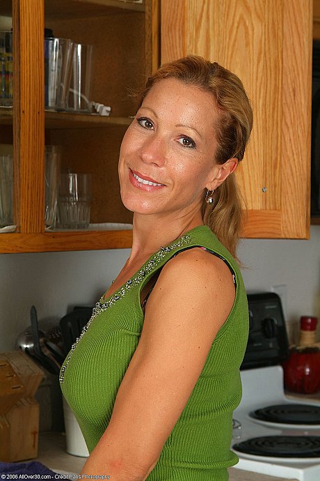 Ravishing housewife Rachel strips in the galley & shows her enormous titties & behind - Image 4 of 20  in Babe category   featuring Kimmie Morr 