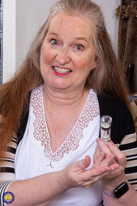 Kinky granny Maggie Mae unpacks her sex toys and tries them on her twat - Image 7 of 20  in Amateur category   featuring Maggie Mae 