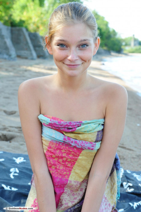 Sweetie with blue eyes and innocent smile Indi shows teenie body off on the beach - #132405
