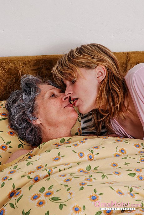 Grey haired old lady Margoth and very hot busty young Judita play with a strapon - Image 2 of 20  in Lesbian category   featuring Judita, Margoth 