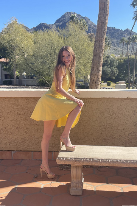 First timer flashes her undressed body underneath clear skies in a yellow dress - #1047762