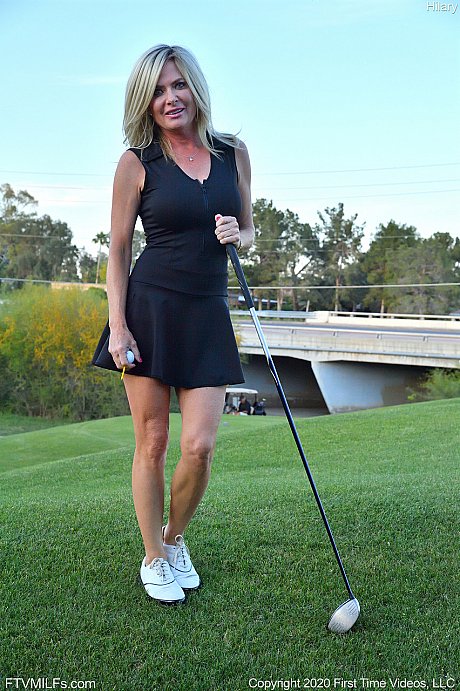 Seductress Hilary flashes her panties & shows her cleavage while playing golf - Image 2 of 20  in Outdoor category   featuring Hilary 