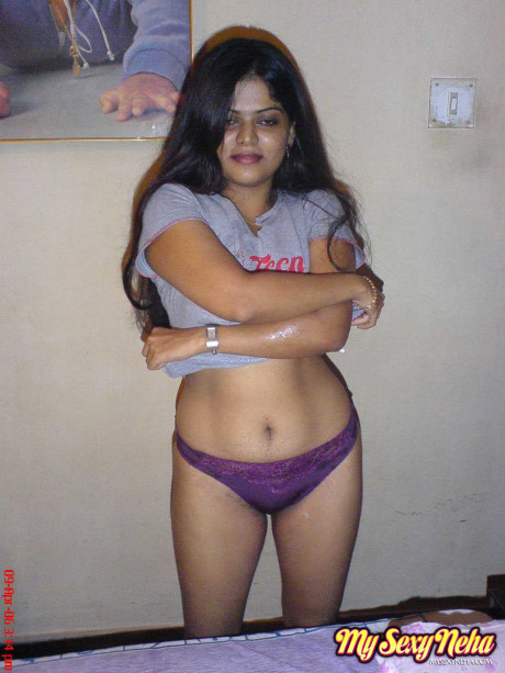 Skinny Indian chick girl girl uncups giant naturals after removing blue jeans