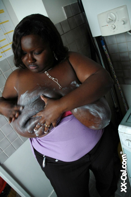 Older BBW ebony Mariana Kodjo oiling & massaging her large melons - #443744