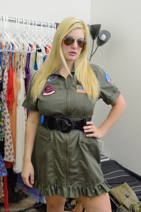 Busty blonde Danielle flashes her big boobies and bald vagina in the uniform shop - #862100