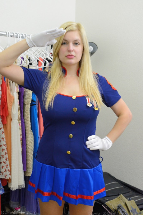 Busty blonde Danielle flashes her big boobies and bald vagina in the uniform shop - #862102