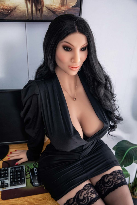 Dark-haired sex doll Andromache bares her monster boobies & ass at work - #959168