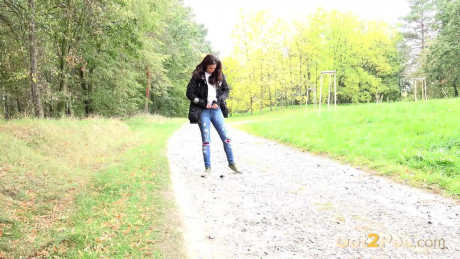 Pretty pretty brunette Ali Bordeaux pulls down ripped jeans to pee on a walking path - #815305